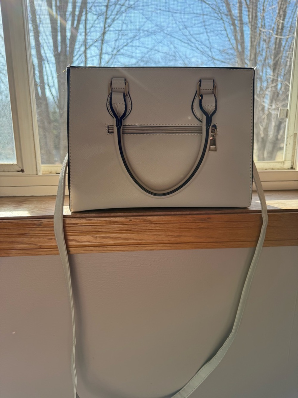 Chic Structured Beige Satchel Handbag with Crossbody Strap & Black Trim